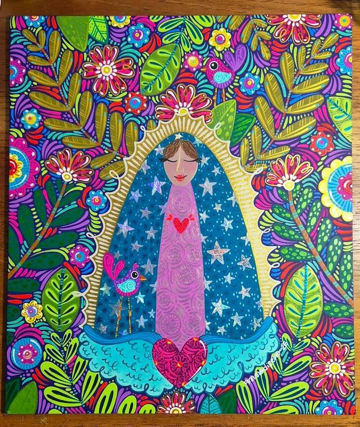 Colorful artwork by AMMO featuring a stylized Virgin of Guadalupe surrounded by birds, flowers, leaves, and intricate nature inspired patterns filled with vibrant detail and movement.