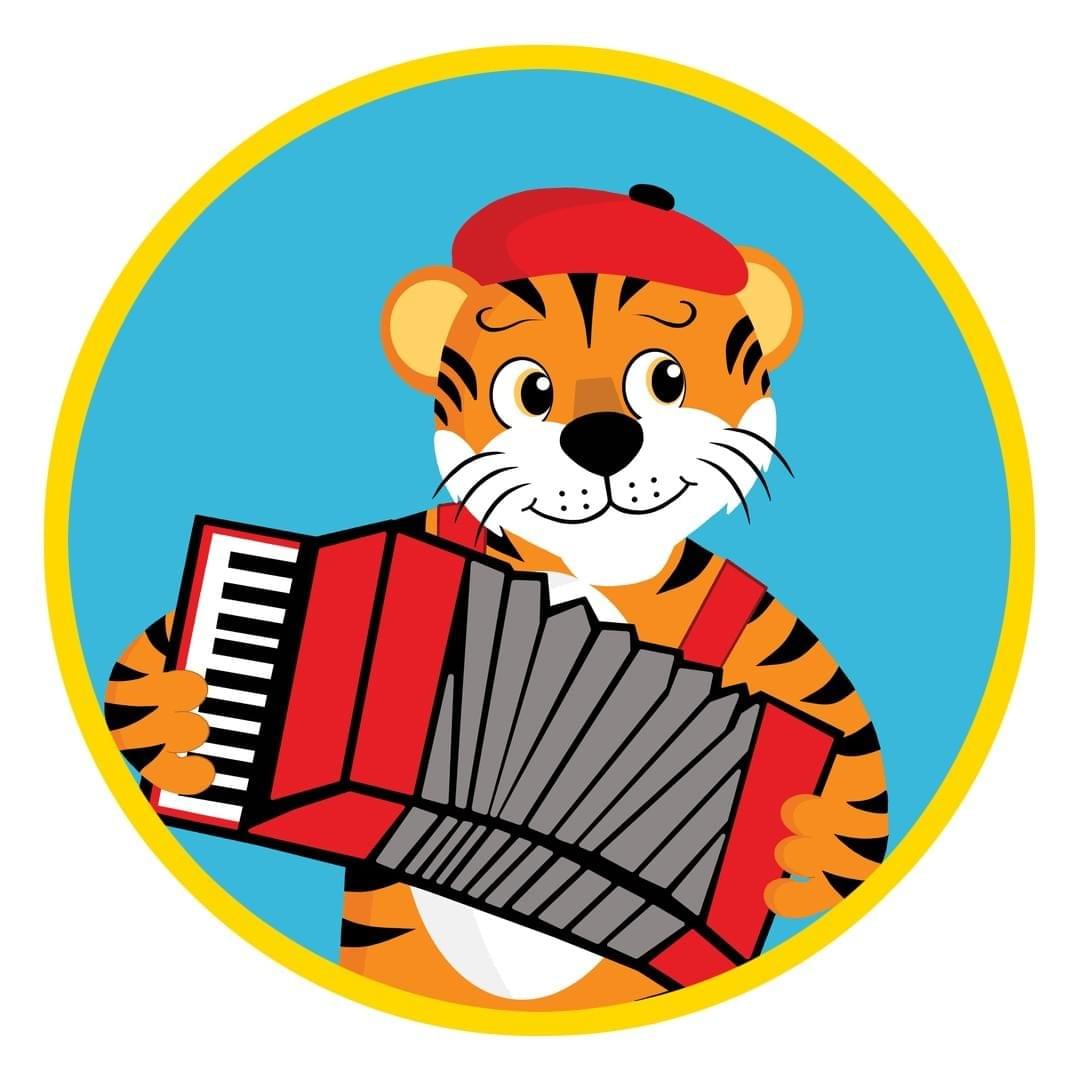 Toby Tiger happily playing an accordion.