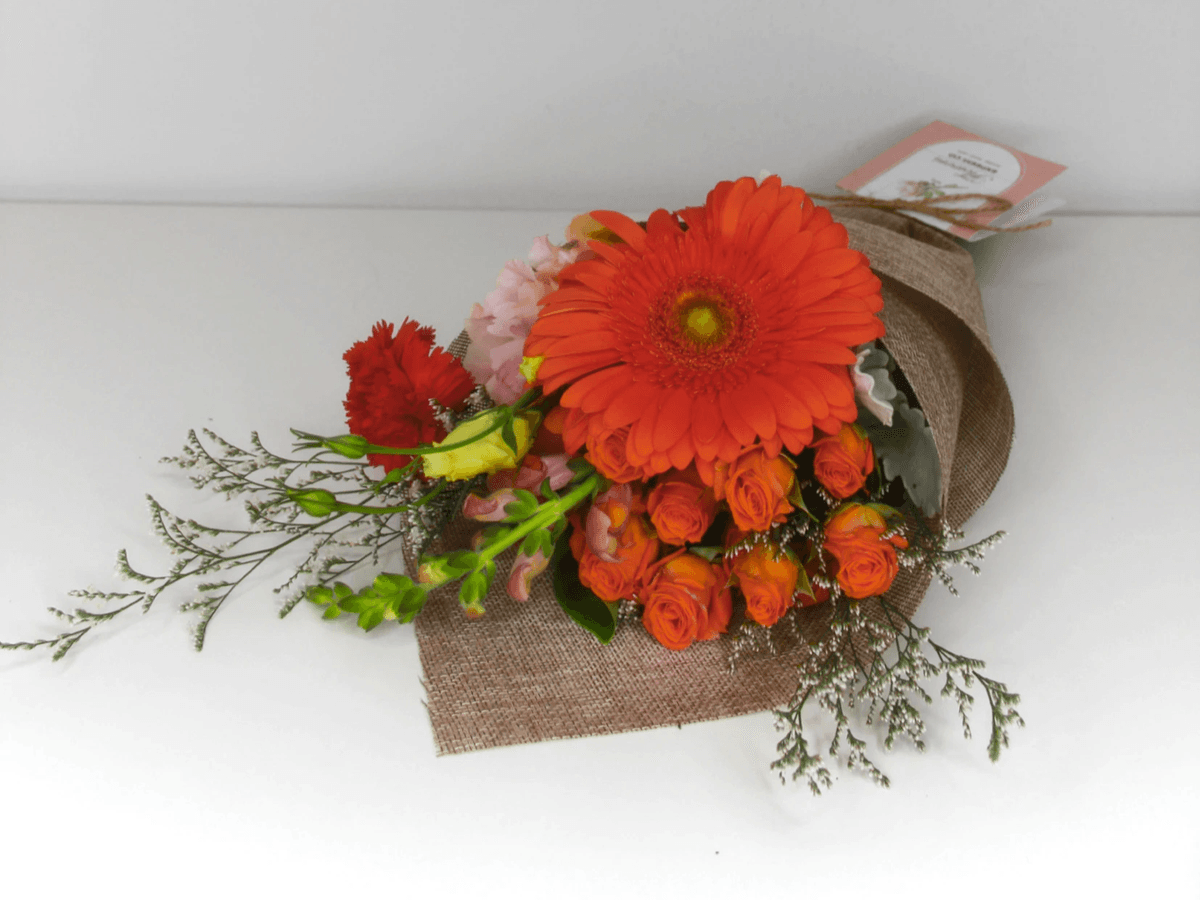 Beautiful orange flower bouquet showcasing vibrant blooms.