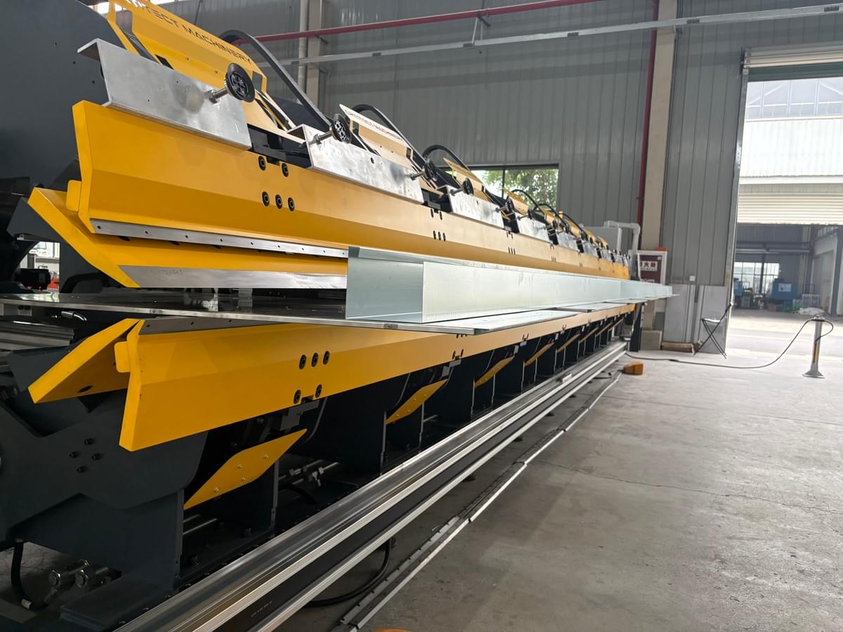 Sheet metal folder producing roofing trim in a fabrication shop