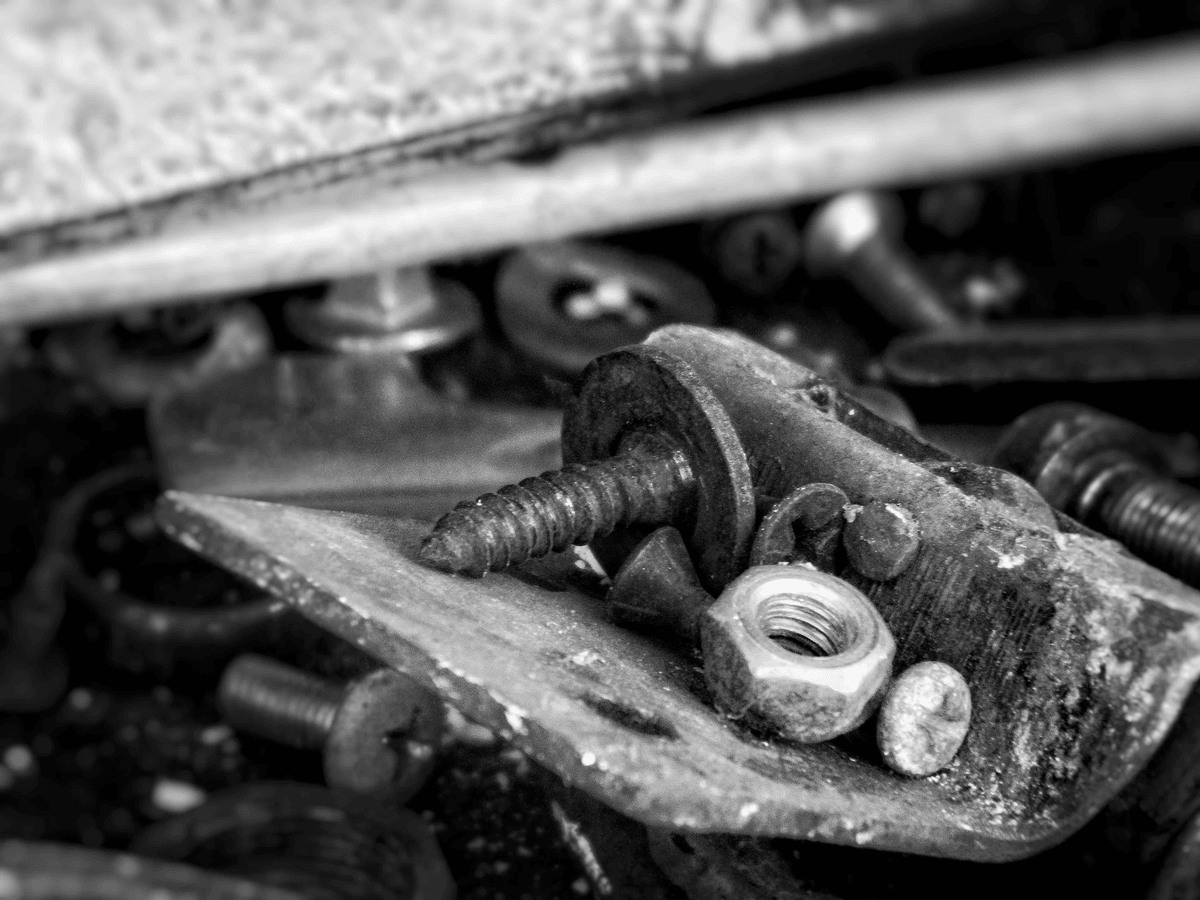 Detailed bolt and nut inspection with torque wrench.