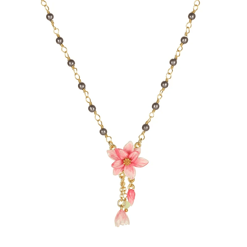 Stunning floral necklaces featuring pink magnolias perfect for any occasion.