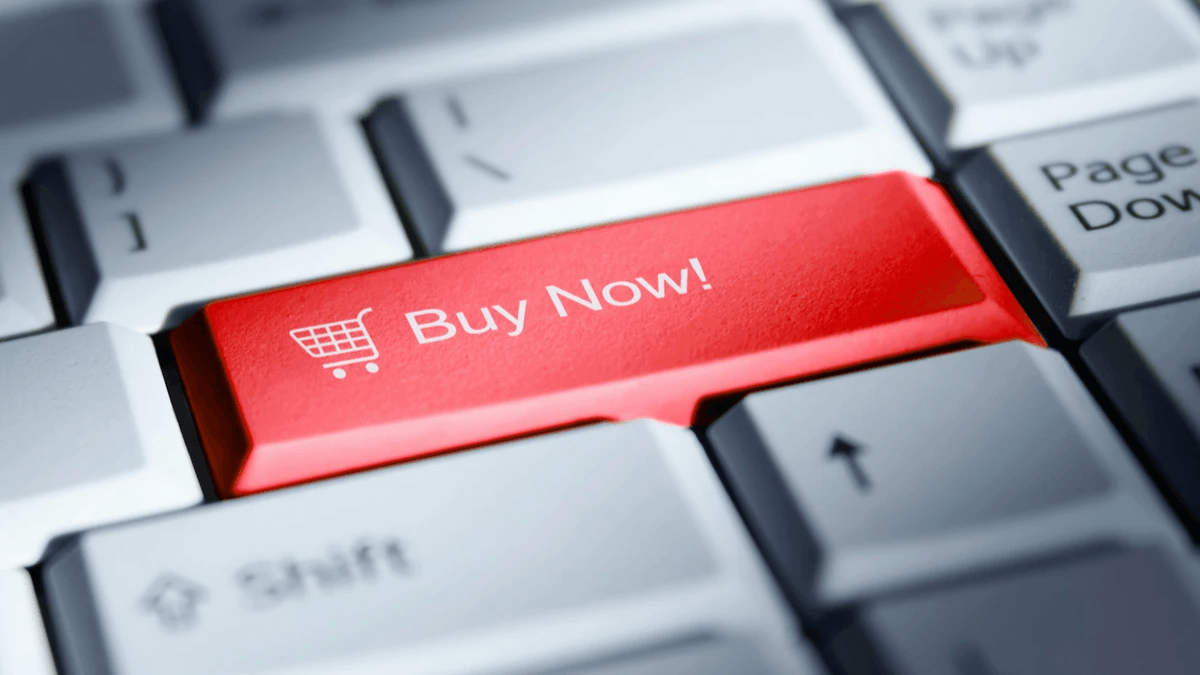 Shopper using a laptop and credit card for a convenient online purchase