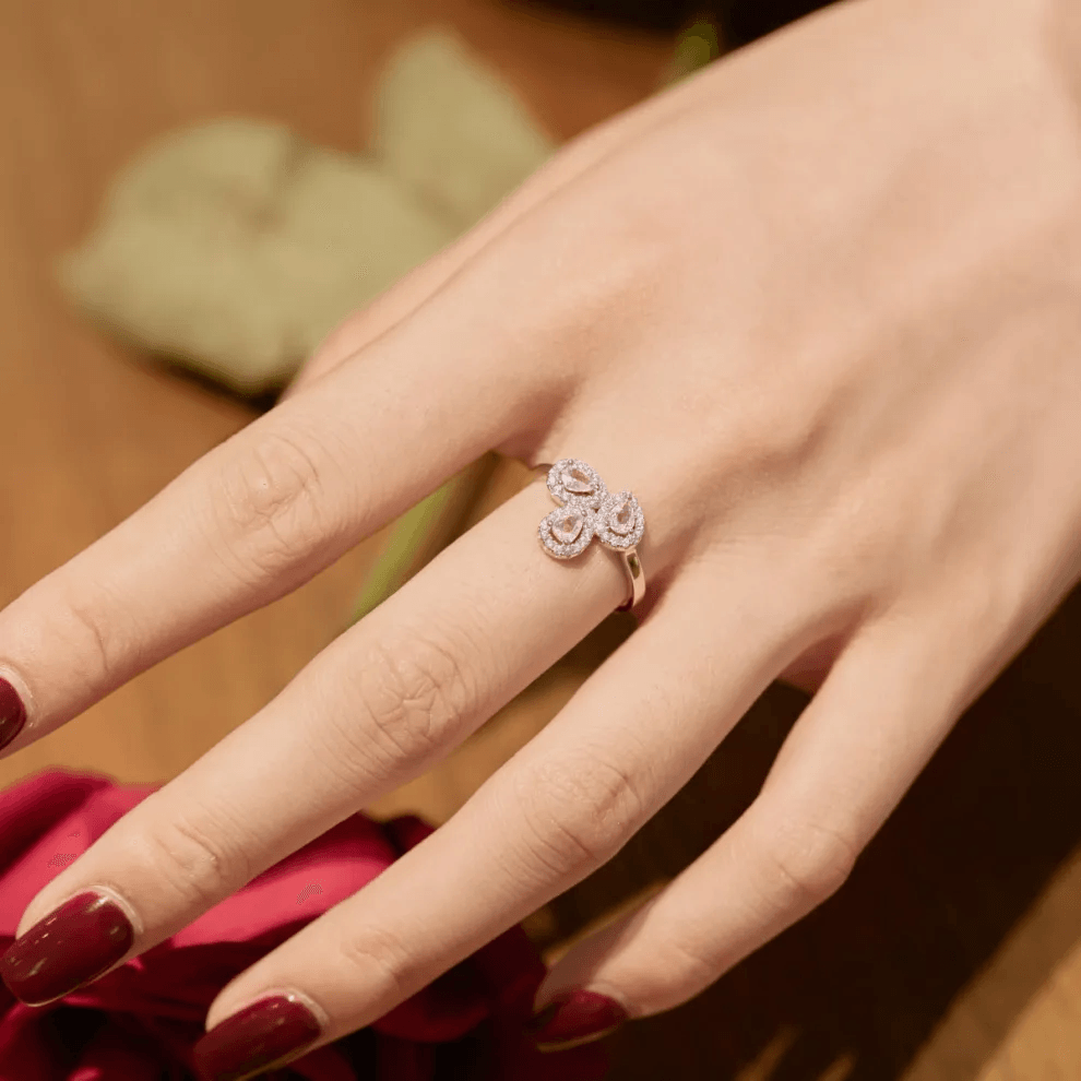 Elegant pink moissanite ring with diamonds