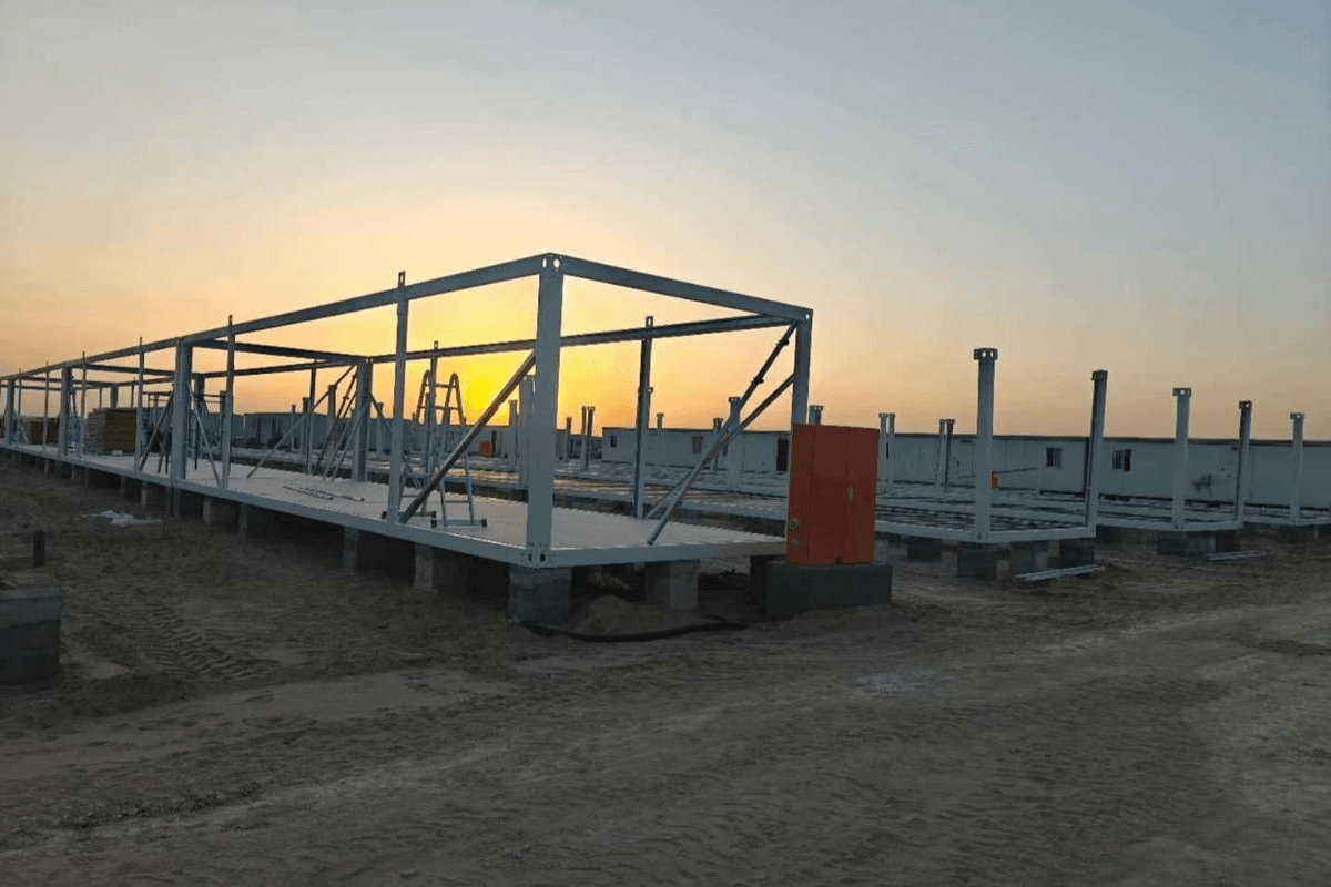 pre engineering building assembly process at construction site