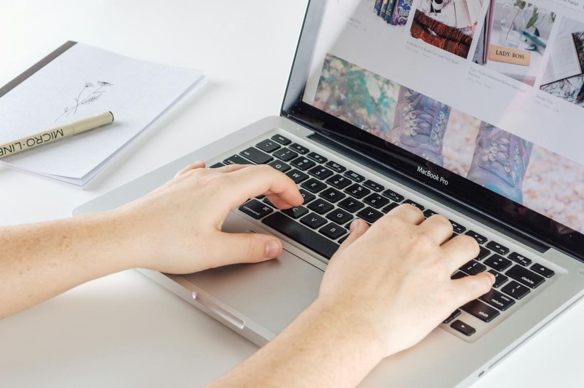 A person reviewing website performance on a desktop screen