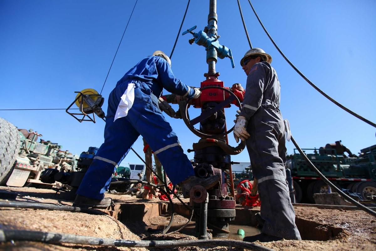 DTH hammer drill working on rock surface DTH hammer drill working on rock surface