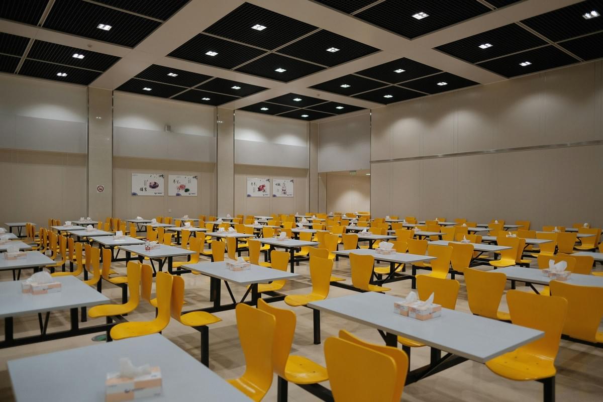 Interior view of a stylish modular canteen showcasing flexible seating.