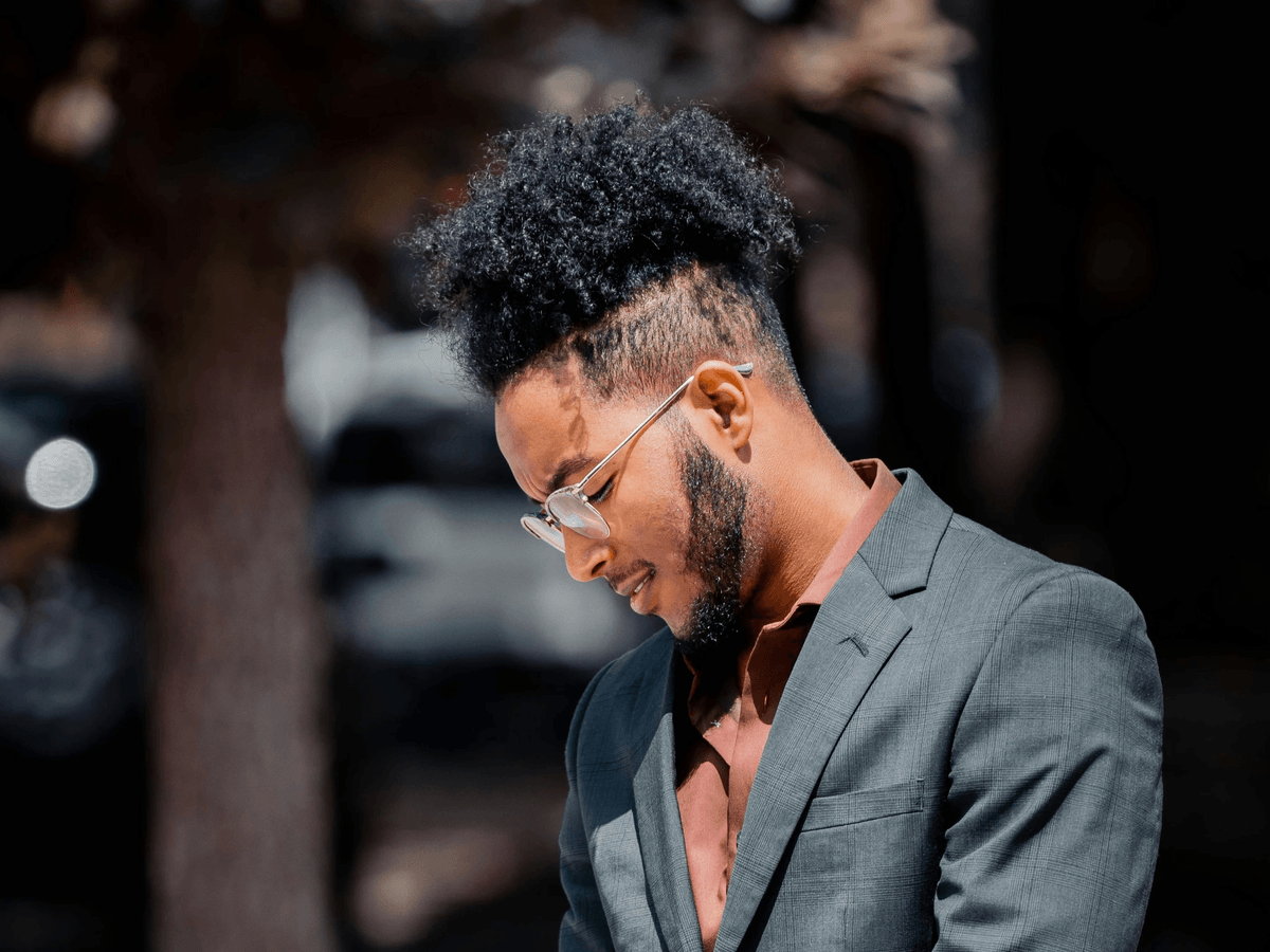 Men embracing hair weaving for men trends in fashion.