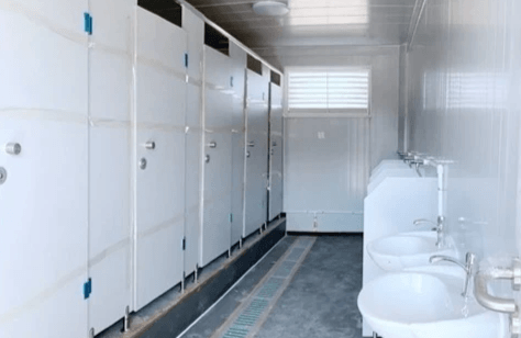 Portable office trailer with toilet amenities enhancing employee comfort