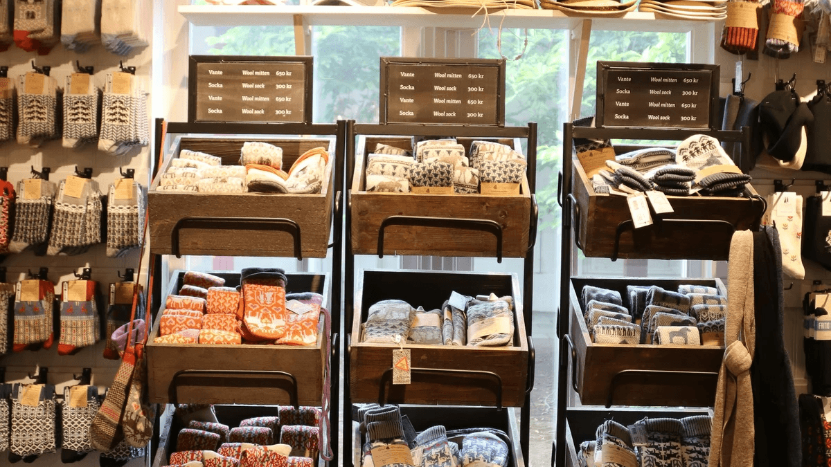 Merchandise arranged across several shelves in a busy retail display
