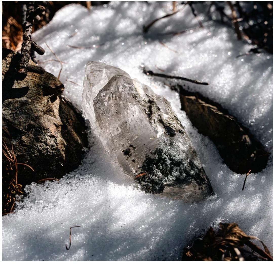 himalayan nirvana quartz displayed among natural elements
