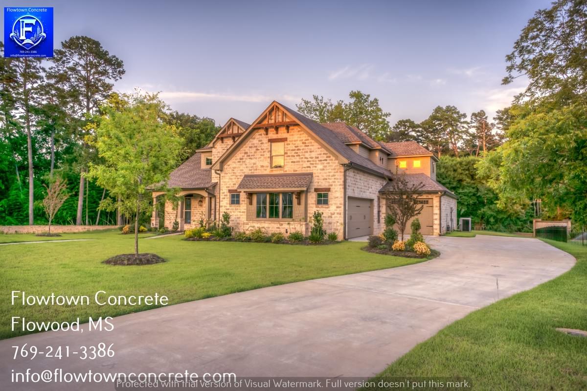 Concrete Driveway by Flowtown Concrete