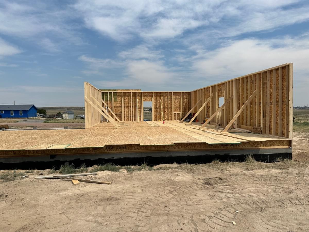 Framing-contractor-crew-framing-up-new-building-colorado-springs-co