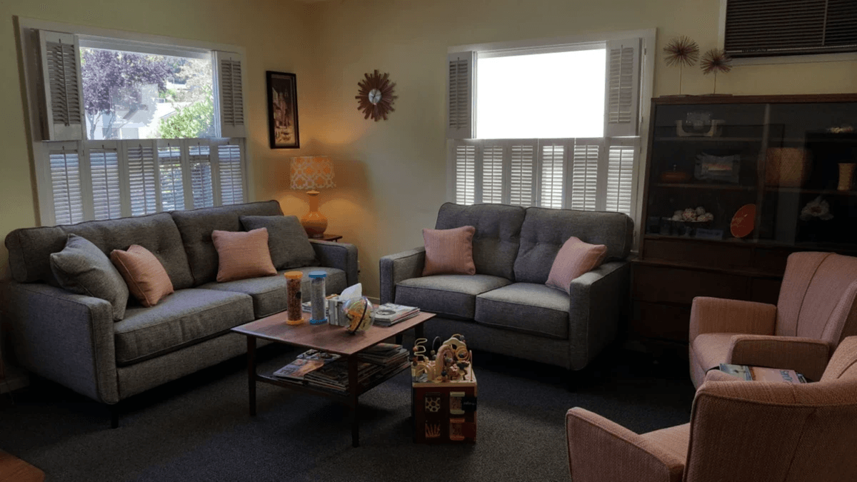 Waiting room with couches and toys