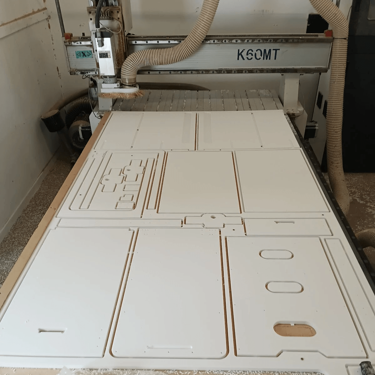 HDPE  Plastic being cut for a cabinet with the CNC