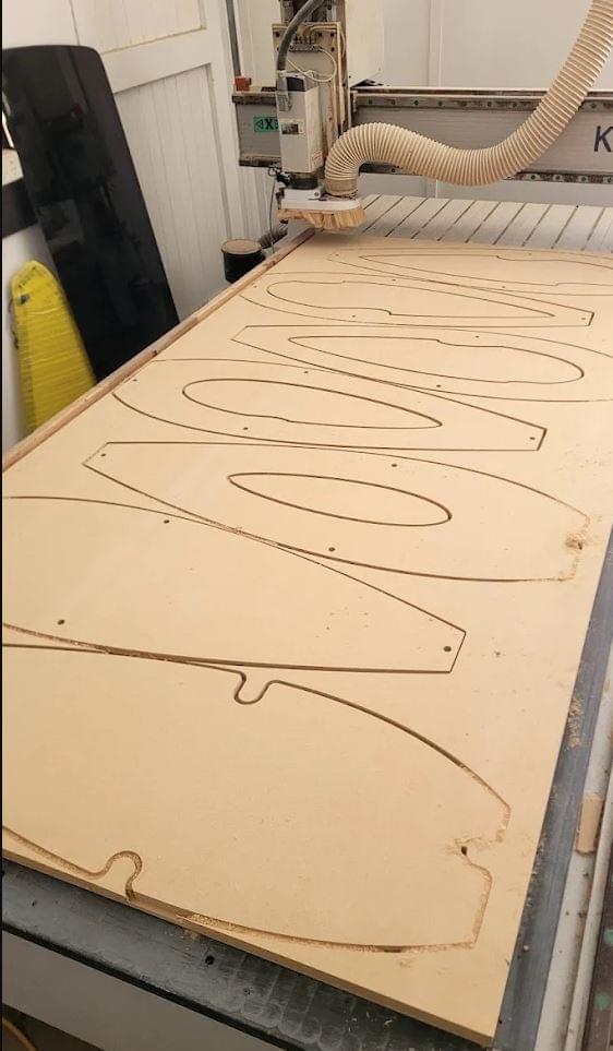 HDPE  Plastic being cut for a cabinet with the CNC