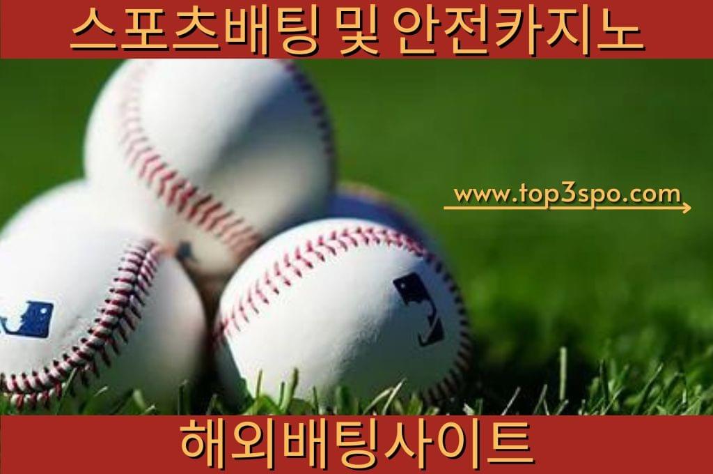 5 baseballs at the sports field