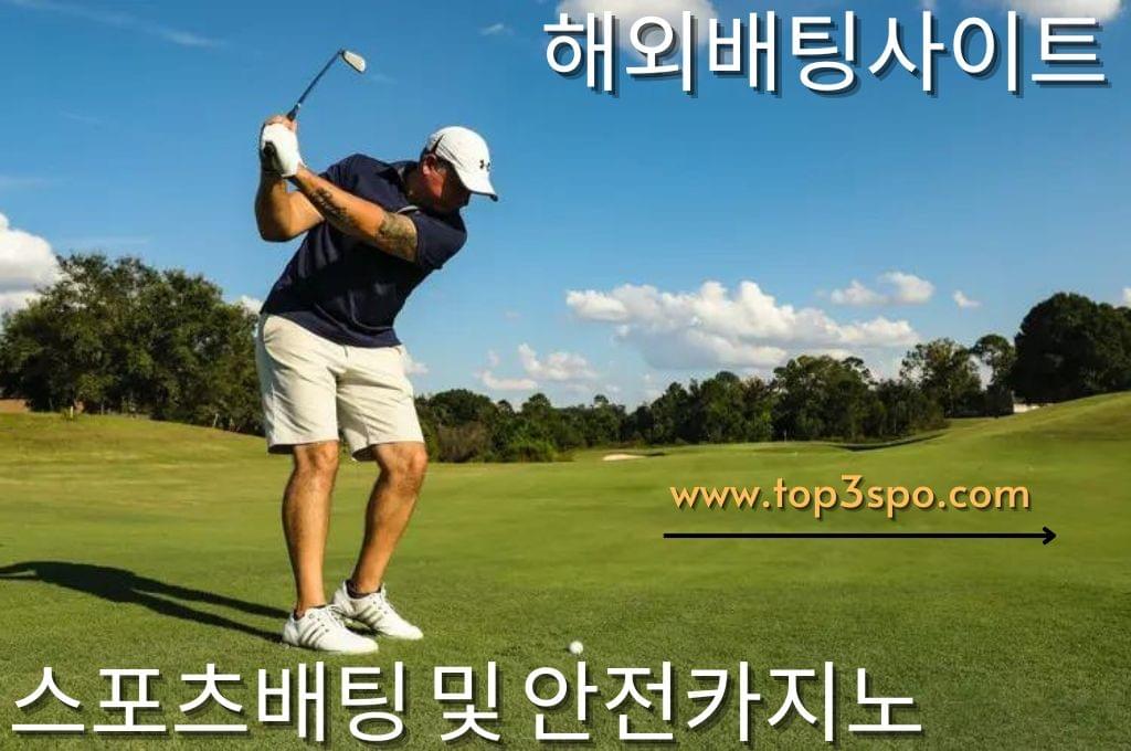 A Man wearing black shirt and white short playing golf.