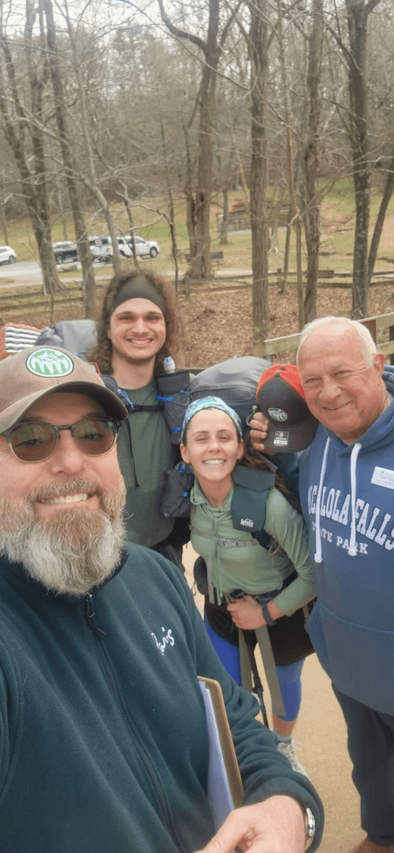 Thru hikers leaving Amicalola Falls State Park with Ironheart John and Mark Schiller IronHike Dawsonville GA