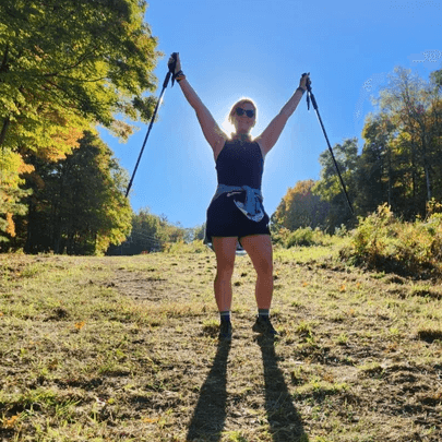 IronHike Mountain Athlete Tasha arms raised in the sun proving herself right endurance Event Mohawk Mountain