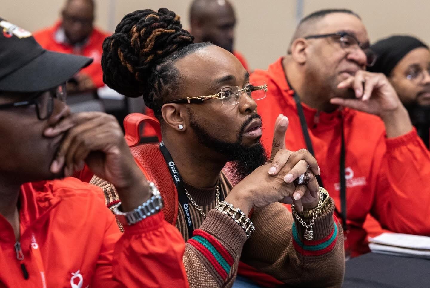 Male educator deeply engaged during national educator professional development conference in Charlotte, North Carolina