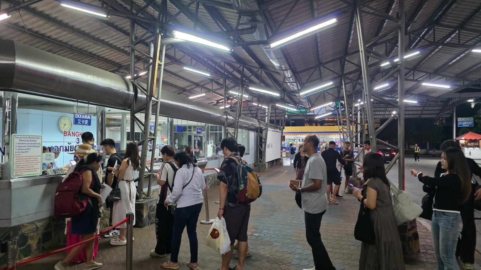 Long Queue at Night for Pattaya to Bangkok Bus Tickets