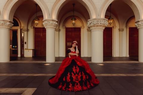 Quinceañera photo of girl in red dress in Las Vegas
