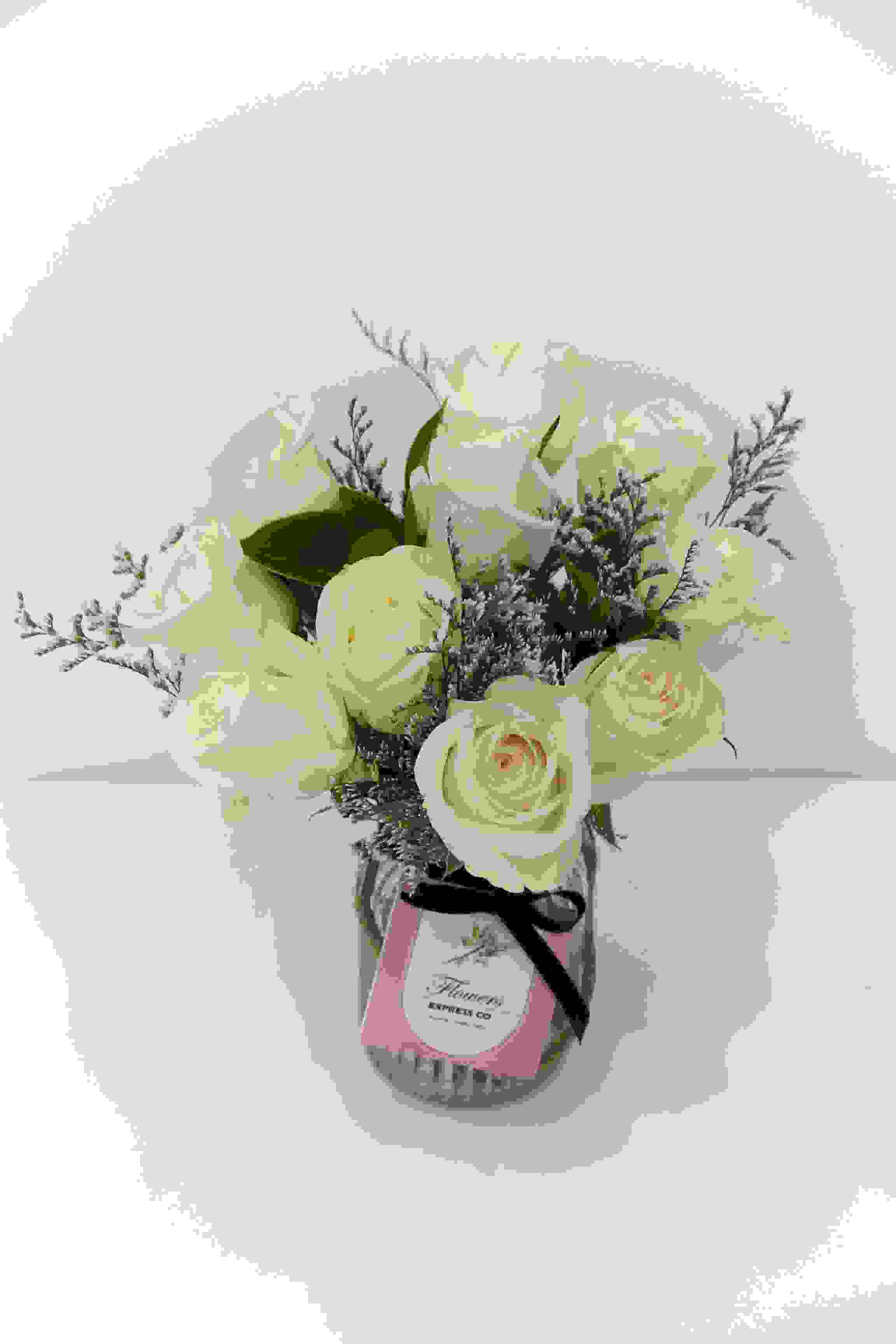 sympathy flowers melbourne arrangement showing lilies and roses
