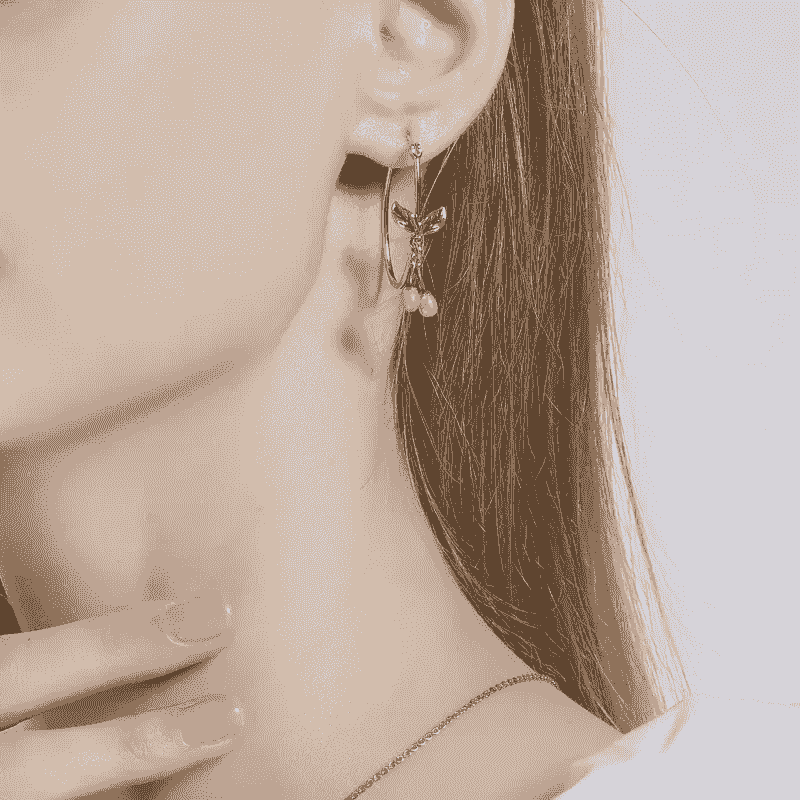 Playful collection of fruit jewelry featuring vibrant earrings and pendants.