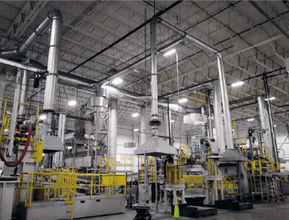 Efficient installation of an aluminum dust collector improving workplace safety.