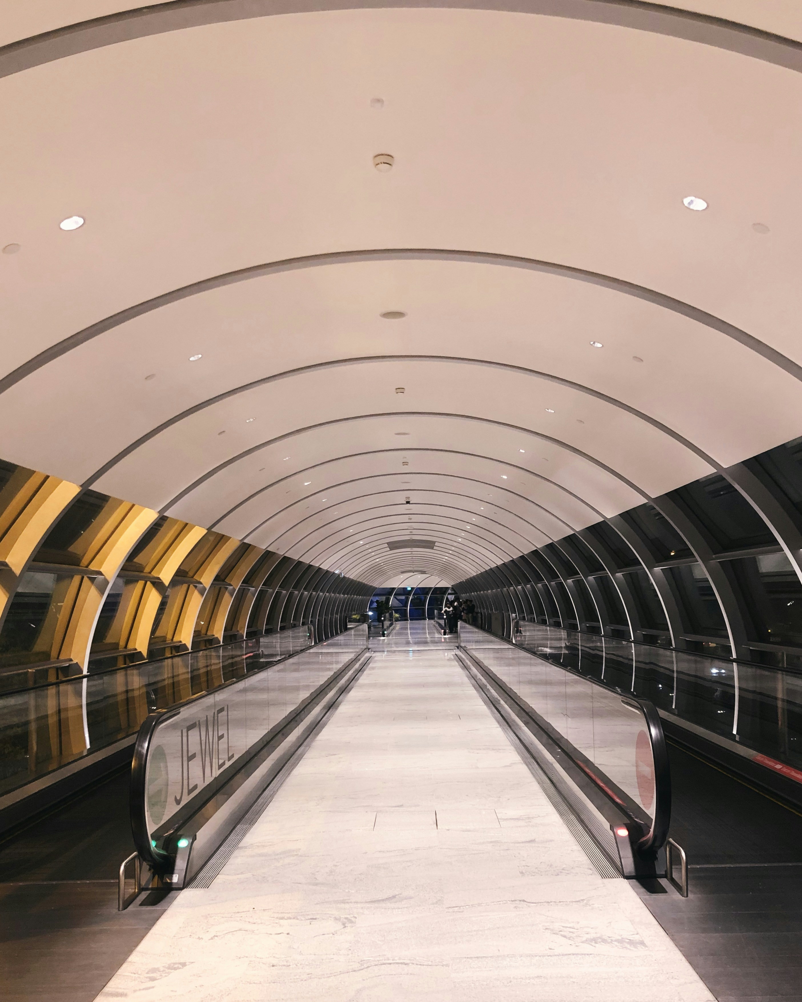 Efficient use of moving walkways at busy airport terminal. Efficient use of moving walkways at busy airport terminal.