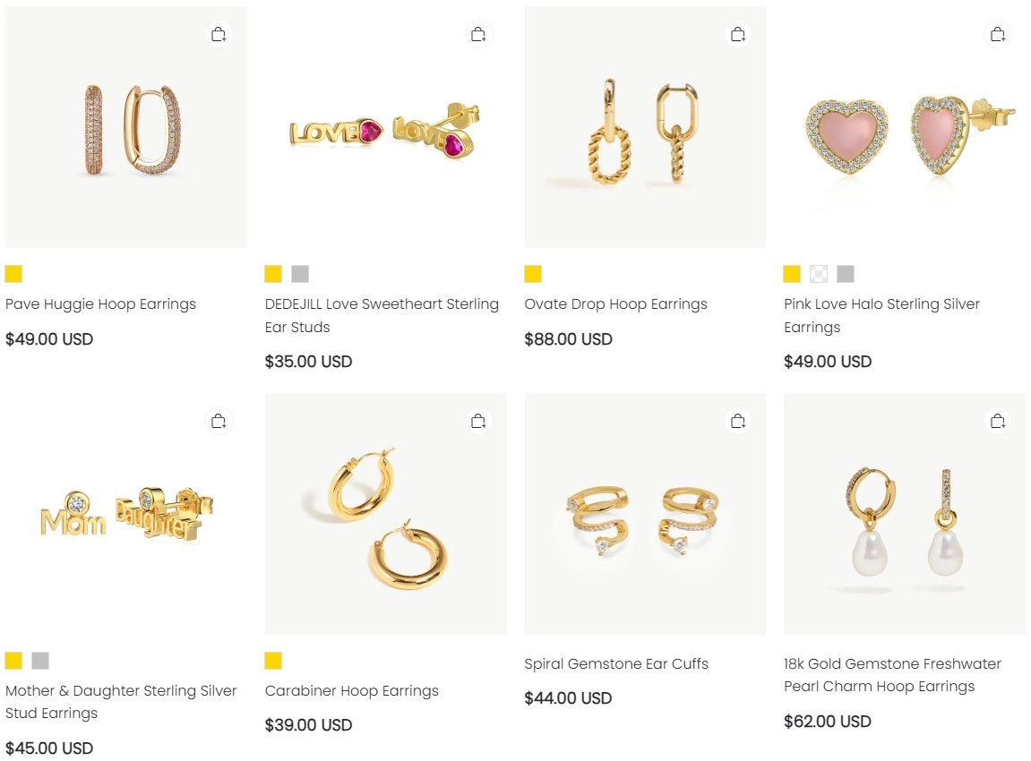 Variety of stylish hoop drop earrings displayed Variety of stylish hoop drop earrings displayed