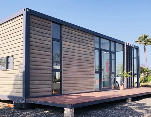 expandable modular house plans showcased in modern mobile home setting