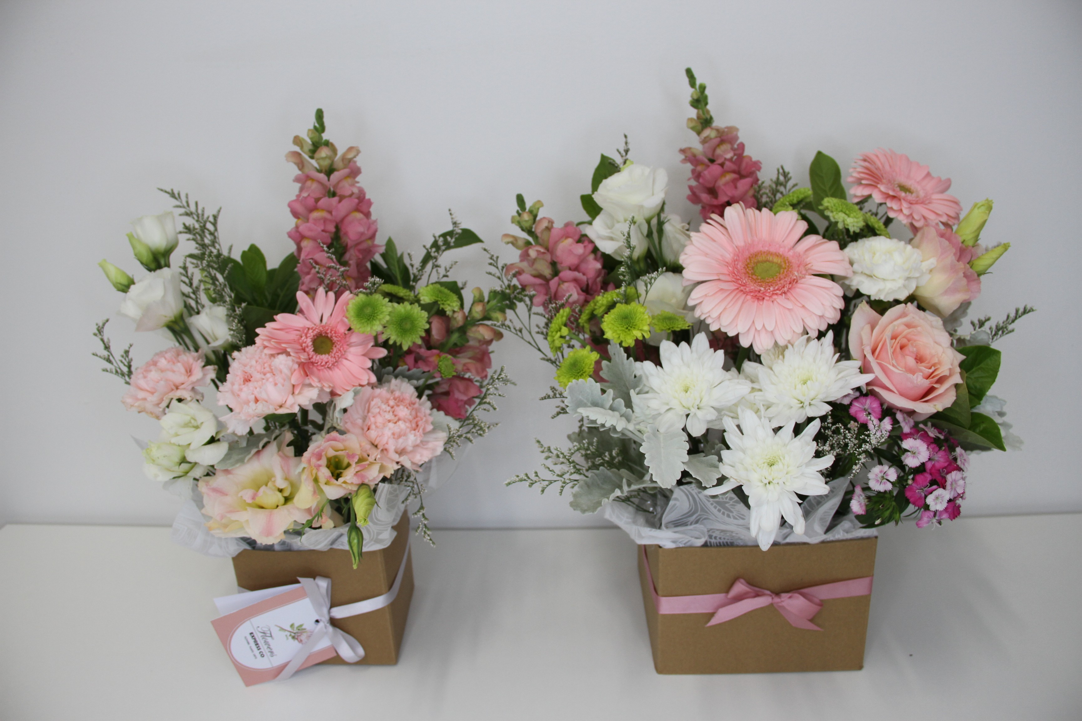 corporate flowers melbourne displayed on an office desk corporate flowers melbourne displayed on an office desk