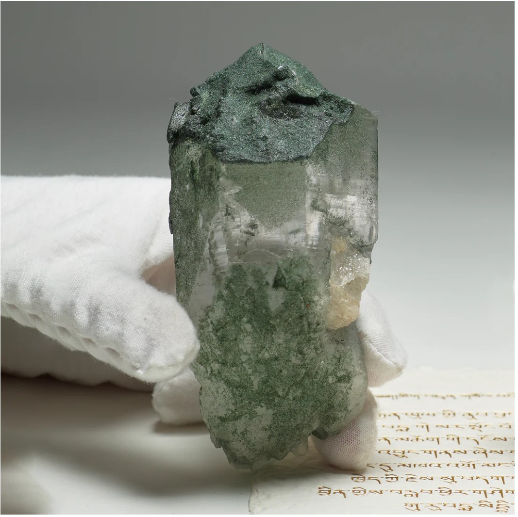 Stunning green phantom crystal highlighting layers within. Stunning green phantom crystal highlighting layers within.