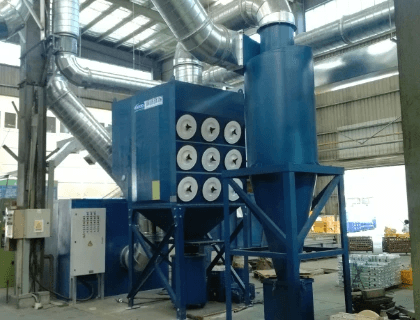 Efficient operation of stainless steel dust collector in industrial setting.