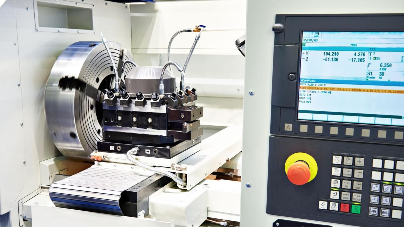 Detailed view of cnc machining milling process in action. Detailed view of cnc machining milling process in action.