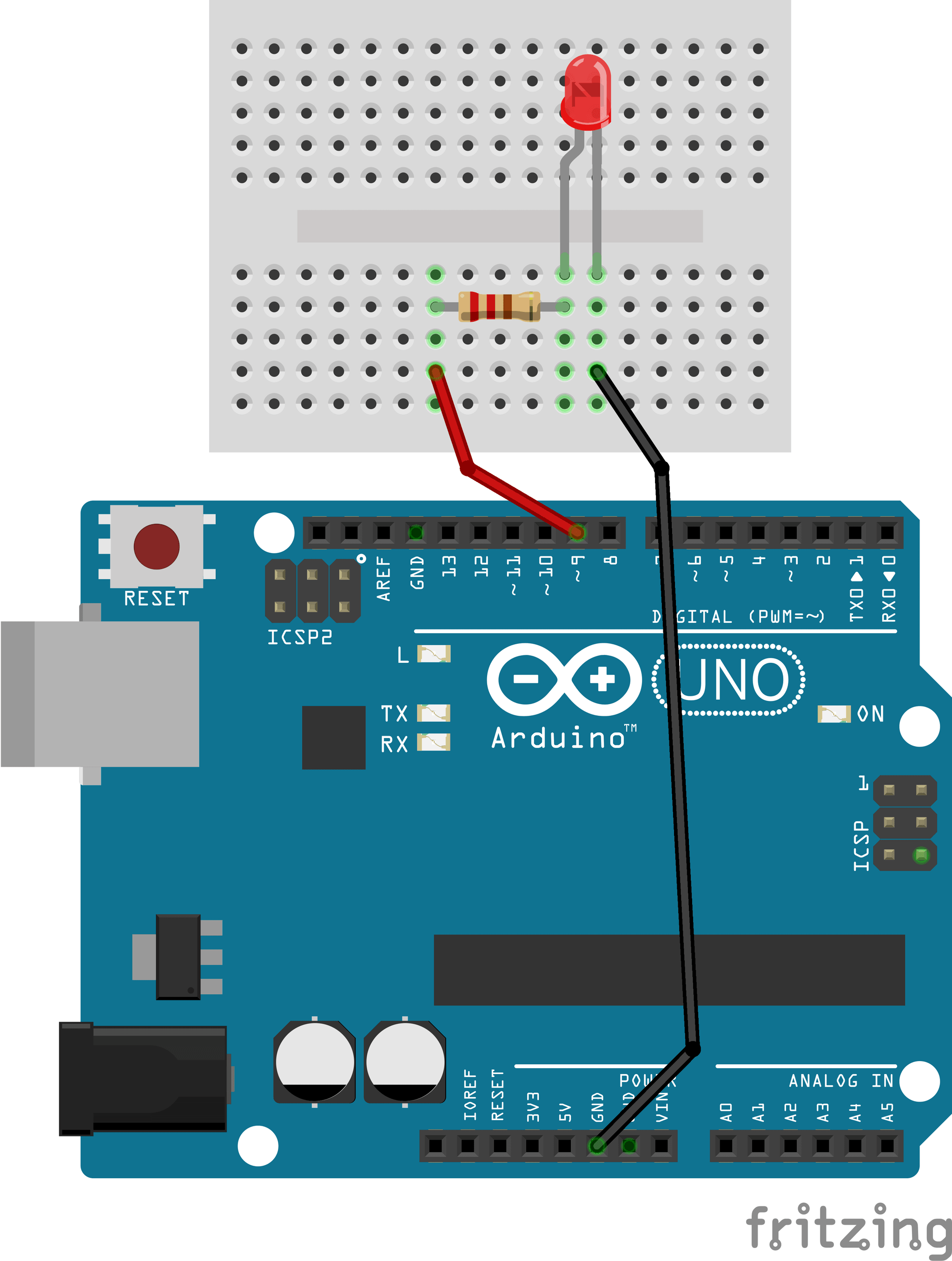 Arduino Uno connected to an LED and resistor on a breadboard